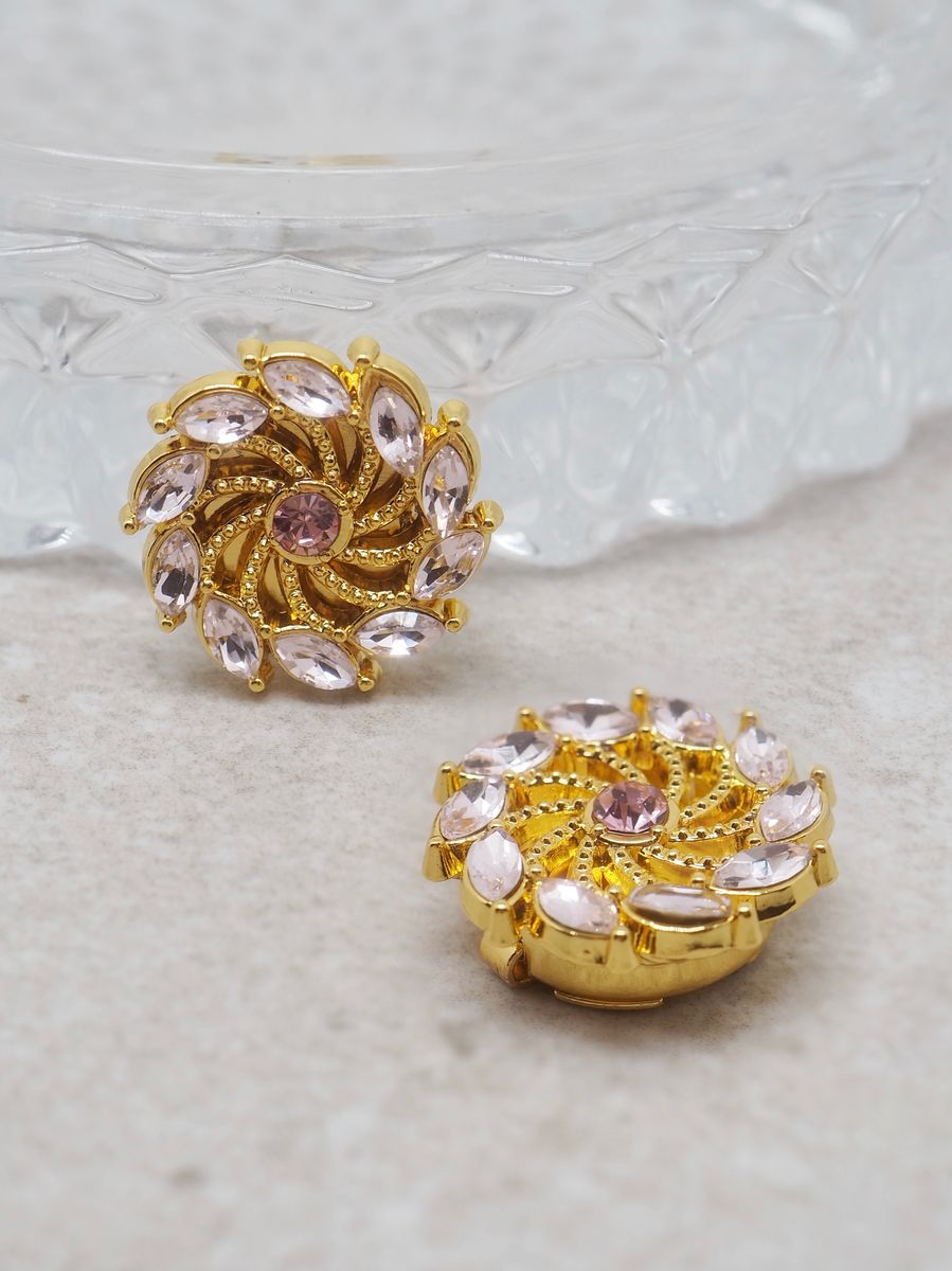 Knappepynt 2stk. gullfarget spinner rosa steiner