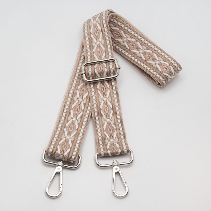 Veskestropp med geometrisk mønster beige krem